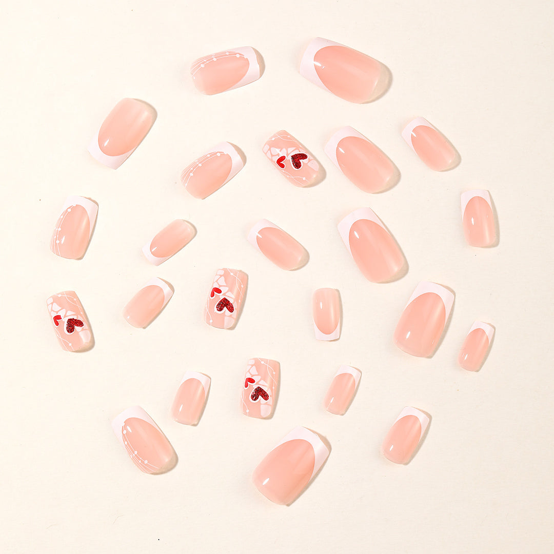 Heart-Embellished Acrylic Nail Art Extensions Stornfield