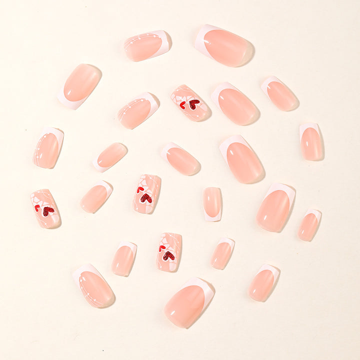 Heart-Embellished Acrylic Nail Art Extensions Stornfield