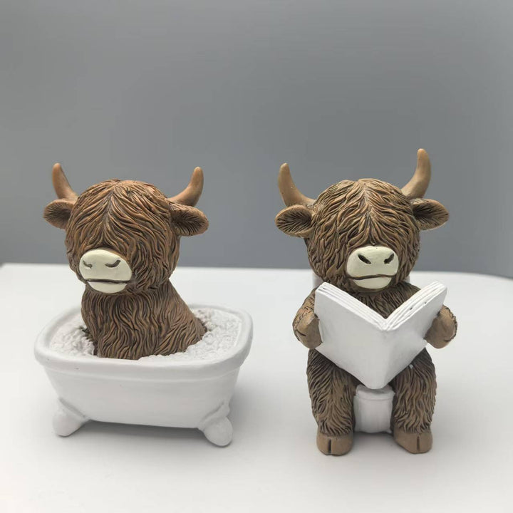 Funny decorative figure of a Highland cow in a bathtub Stornfield