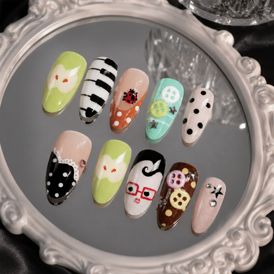 Creative nail art set with playful patterns and 3D details Stornfield