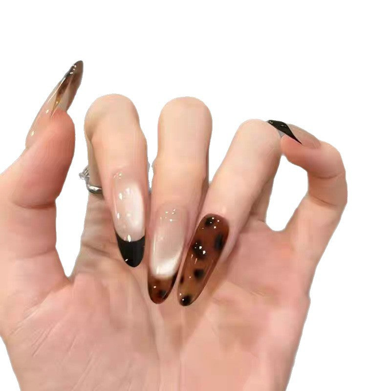 Artistic Press-On Nail Set with Elegant Floral and Gemstone Accents Stornfield