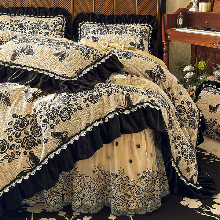 Opulentes quilted duvet cover set with velvet frill, embroidered ruffle, and bed ruffle