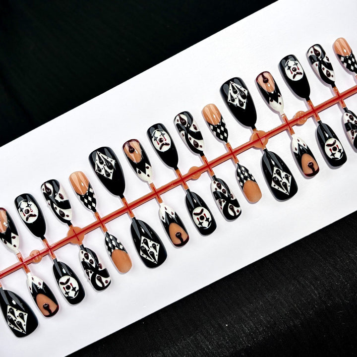 Artistic Press-On Nail Art Set with Theatrical Designs