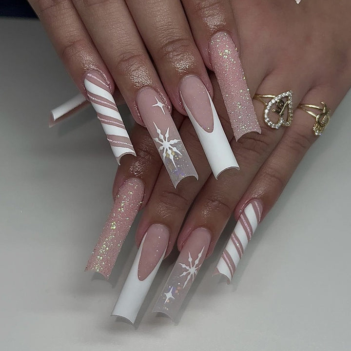 Creative Nail Art Set with Festive Candy Cane Design and Glittering Accents Stornfield