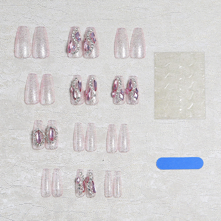 Glamorous artificial nails with sparkling rhinestone decorations Stornfield