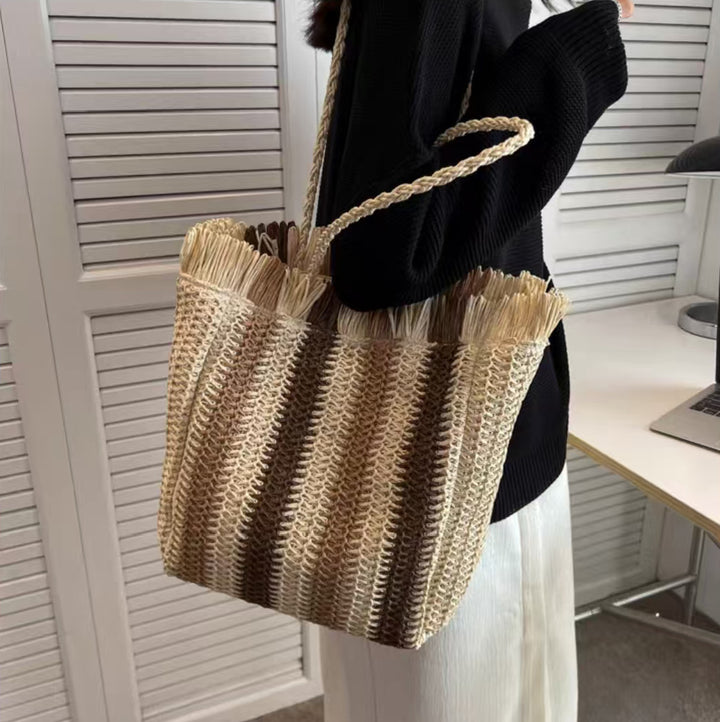 Braided beach bag with fringe details Stornfield