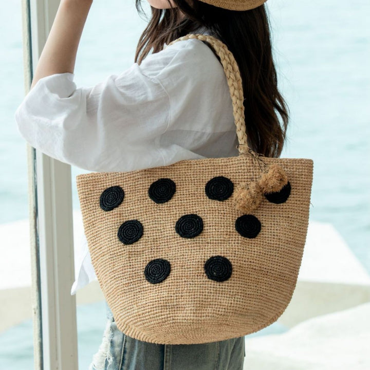 Handcrafted straw bag with eye-catching accents Stornfield