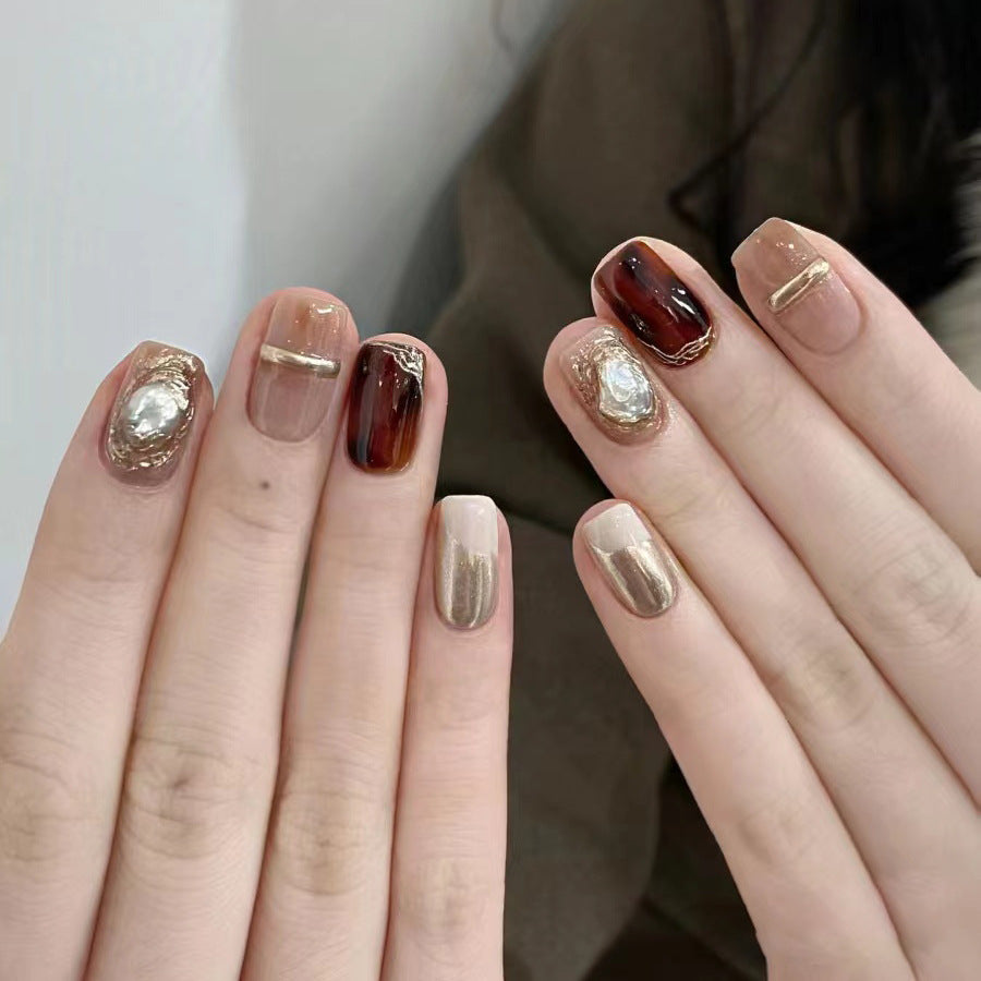 Elegant Nail Art Set with Unique Marble and Metallic Accents Stornfield