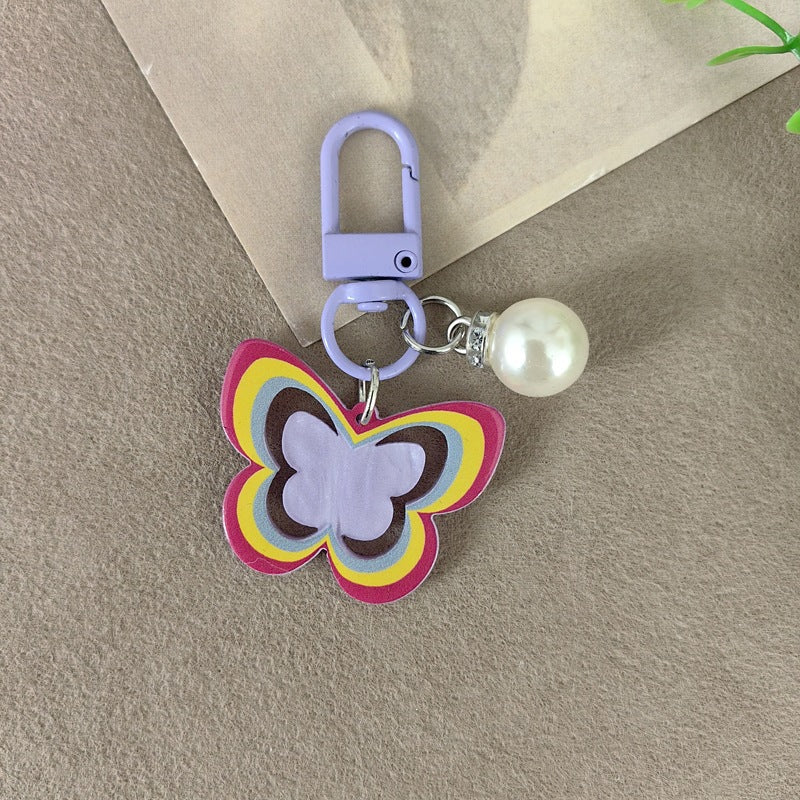 Keychain with butterfly and pearl accent Stornfield