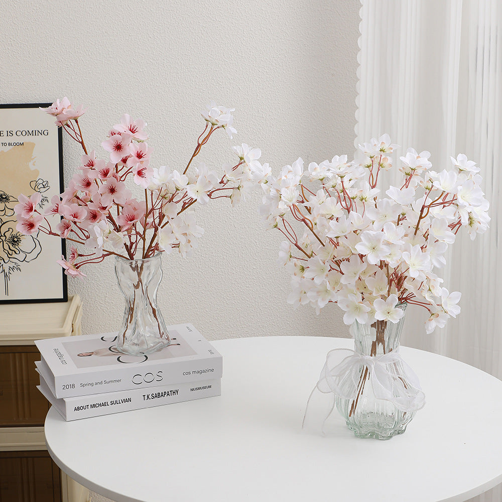 Artificial cherry blossom branch with detail-loving flowers
