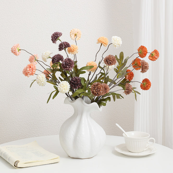 Artificial flower branch with intricate flowers