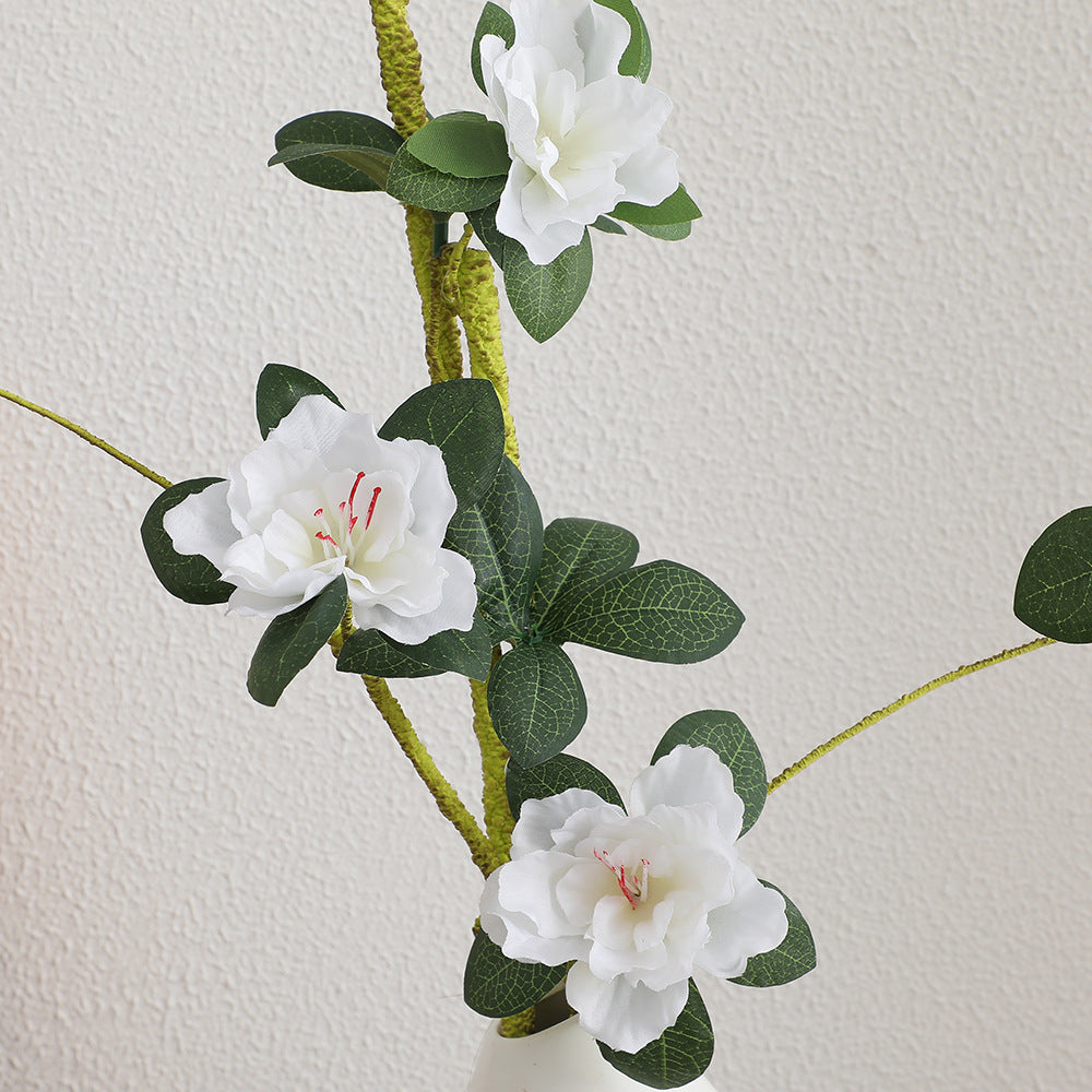 More elegant artificial flower branch with realistic blooms and leaves