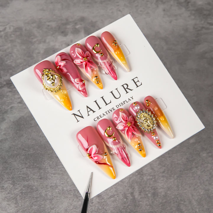 Artistic Stiletto Press-On Nail Set with Floral and Gem Accents