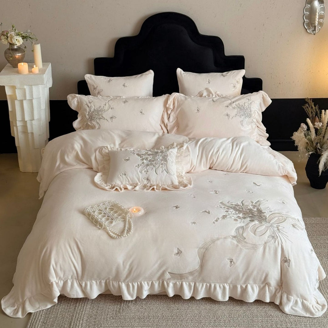 Luxurious bedding set with ruffles and floral embroidery