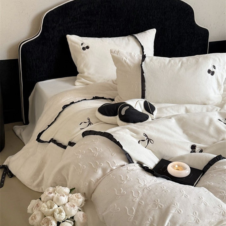 Reversible cotton satin bedding set with embroidered cherry, delicate frill and decorative bows Stornfield