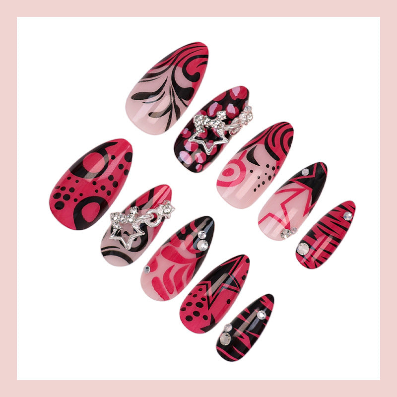 Nail art set with playful patterns and rhinestone embellishments Stornfield