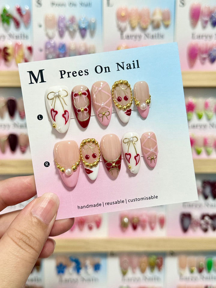 Artistic Press-On Nail Set with Floral and Green Accents