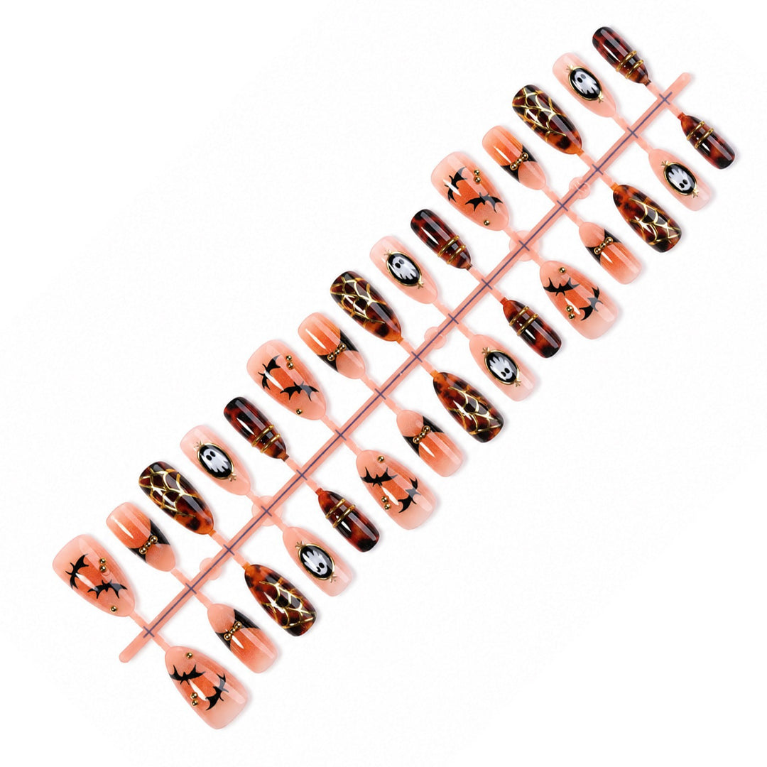 Halloween Artificial Nail Set with spooky designs and golden accents Stornfield