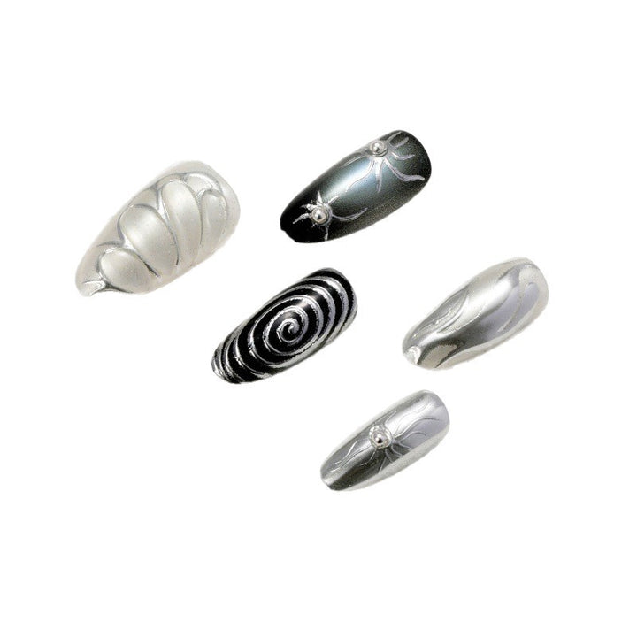 Artificial nails with metallic effects and complex designs Stornfield
