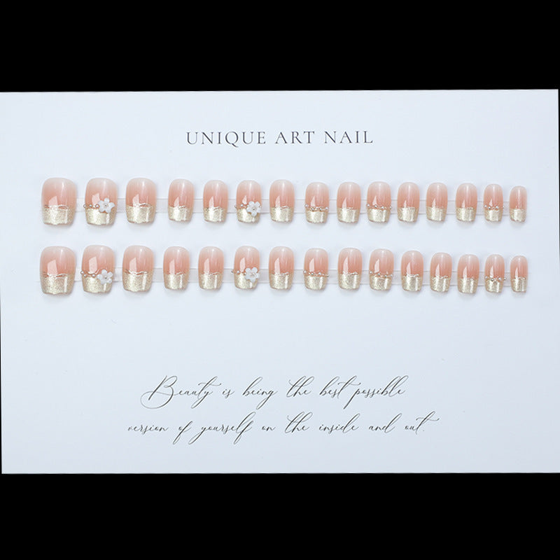 Decorative Press-On Nail Extensions with Floral Accents Stornfield
