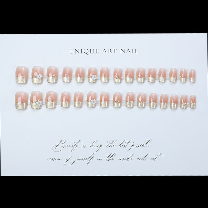 Decorative Press-On Nail Extensions with Floral Accents Stornfield