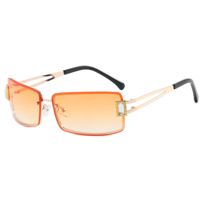 Ladies stylish sunglasses with elegant trapezoidal lenses and filigree metal frame Stornfield