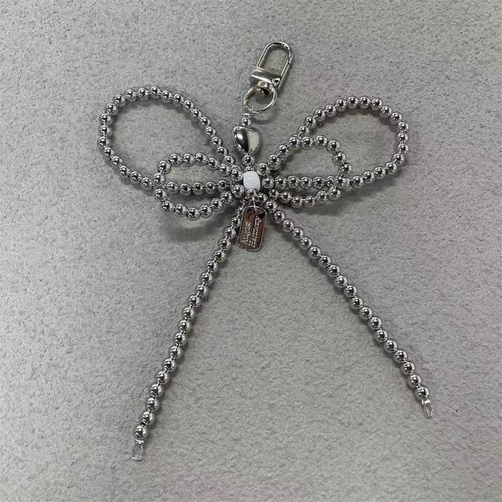 Elegant Pearl Bow Keychain Stornfield