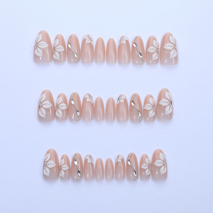 Elegant artificial nails with floral decorations Stornfield