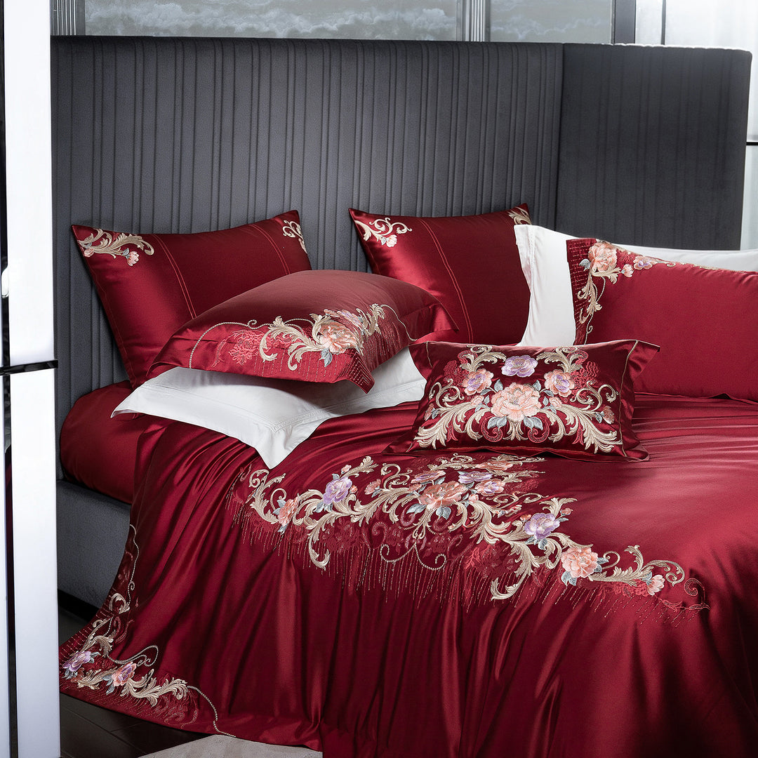 Embroidered satin bedding set with luxury appliqués