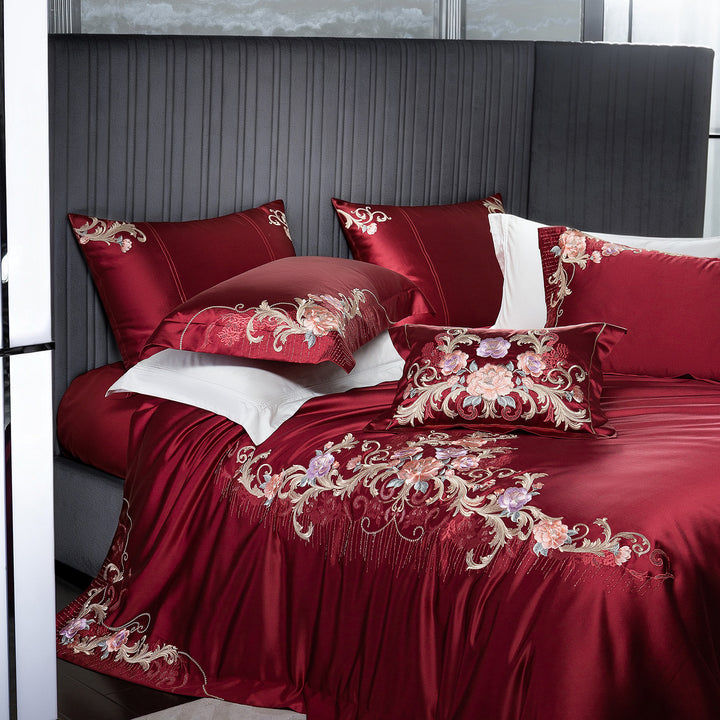 Embroidered satin bedding set with luxury appliqués