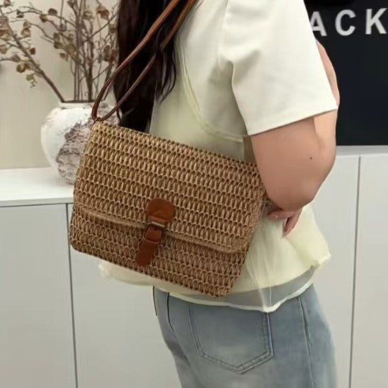 Handbag made of woven natural material with leather accents Stornfield