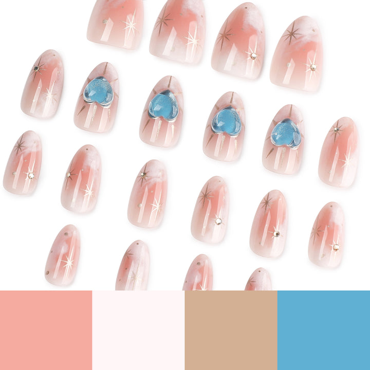 Nail design with decorative hearts and glitter accents Stornfield