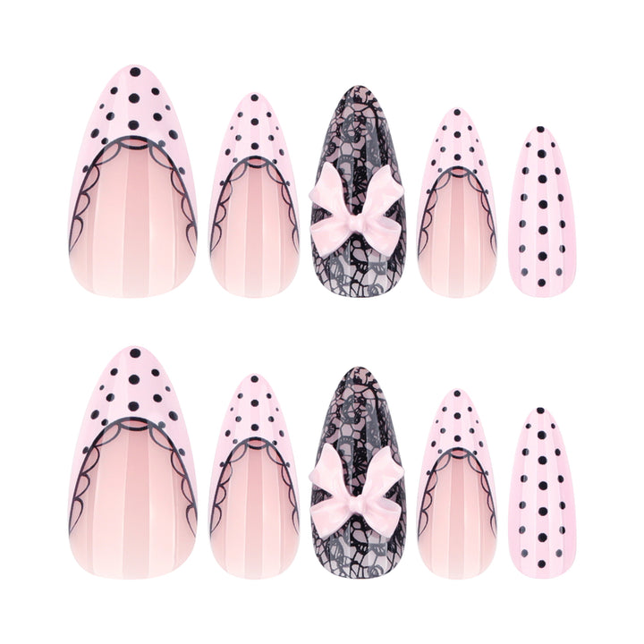Elegant and artistic stiletto nails with tips and bows Stornfield