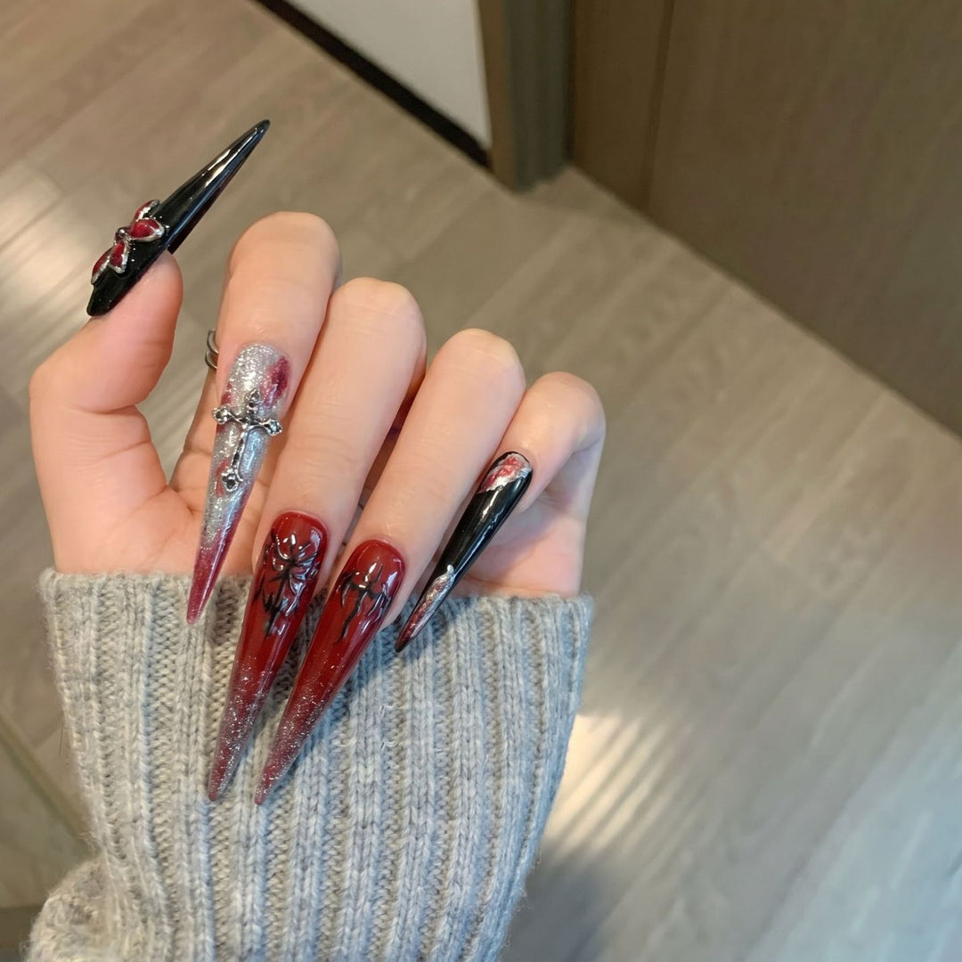 Artistic Stiletto Press-On Nail Set with Unique Gothic Design Elements Stornfield