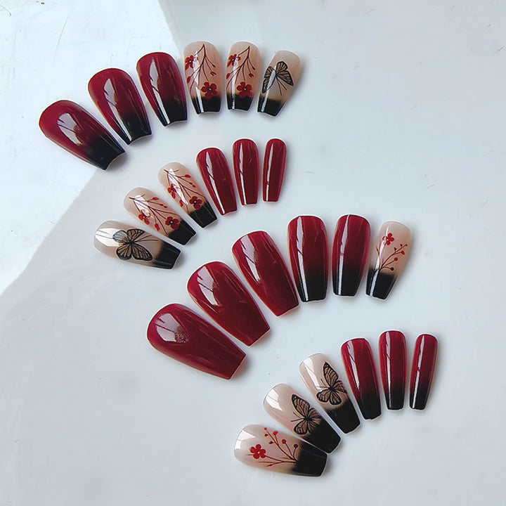 Artificial nails with butterfly and flower motifs Stornfield