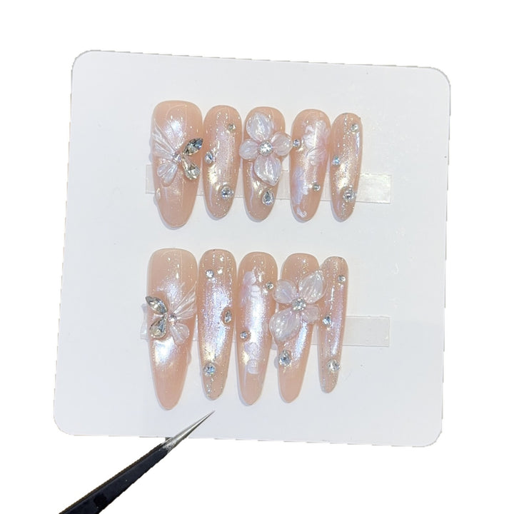 Art nails with floral motifs Stornfield