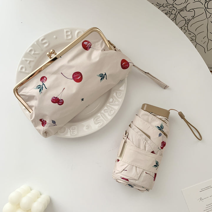 Ladies elegant folding umbrella with floral design and practical case Stornfield