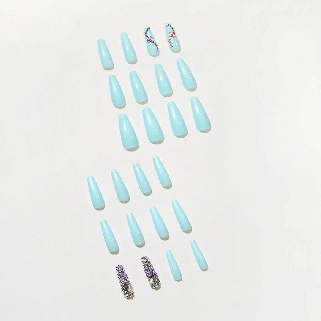 Glamorous artificial nails with sparkling rhinestone embellishments Stornfield