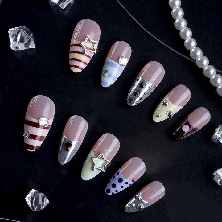 Artificial nails with creative design and sparkling accents Stornfield