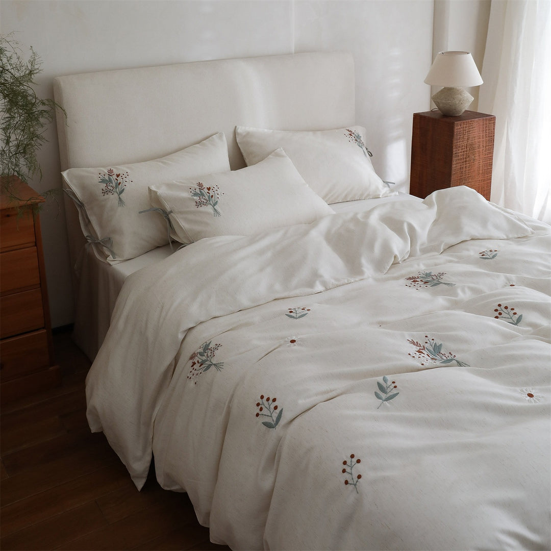 Embroidered cotton bedding set with bow pillowcases and dried flower embroidery
