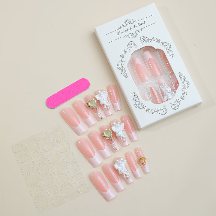 Artificial nail set with luxurious flower and pearl decorations Stornfield