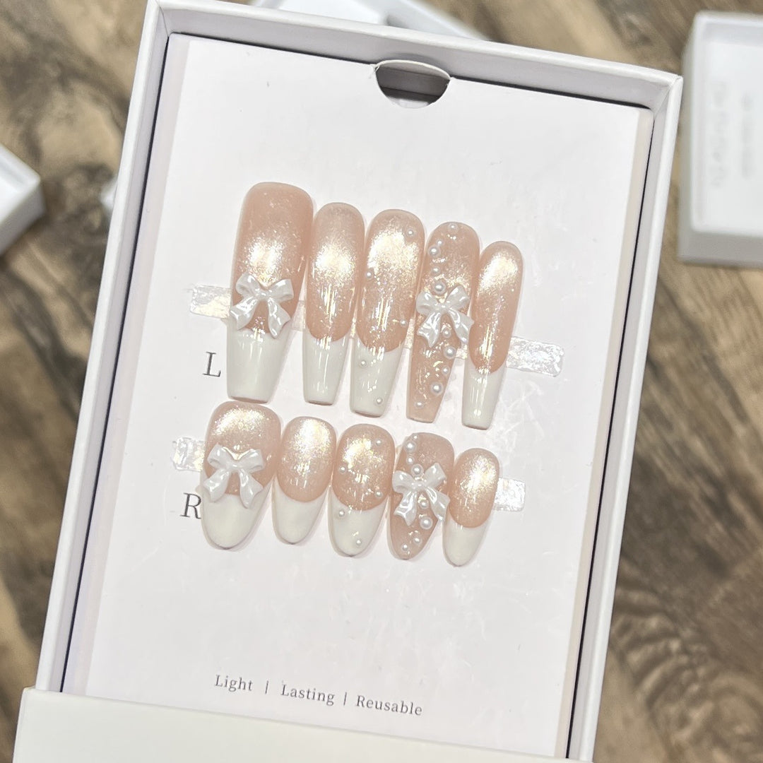 Decorative Long Press-On Nail Set with Bow and Pearl Accents Stornfield