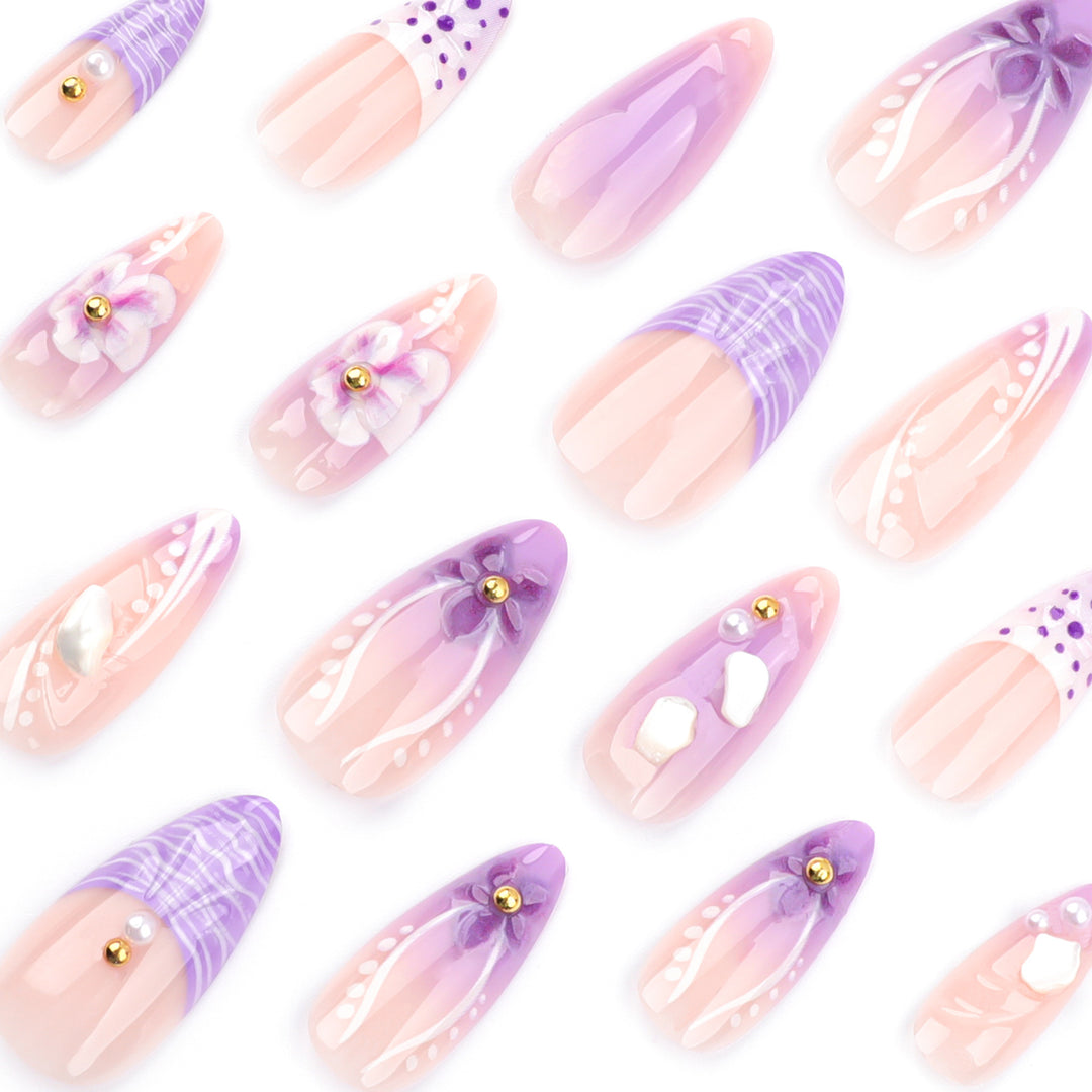 Artful nail extensions with elegant floral embellishments Stornfield
