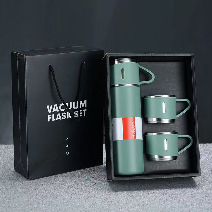 Women’s stainless steel vacuum flask with two accompanying cups Stornfield