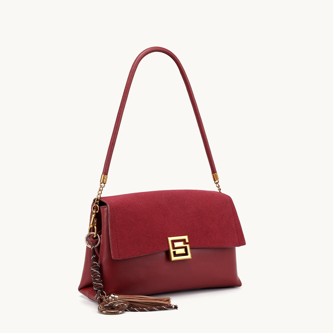 Elegant Suede Handbag with Gold Accents