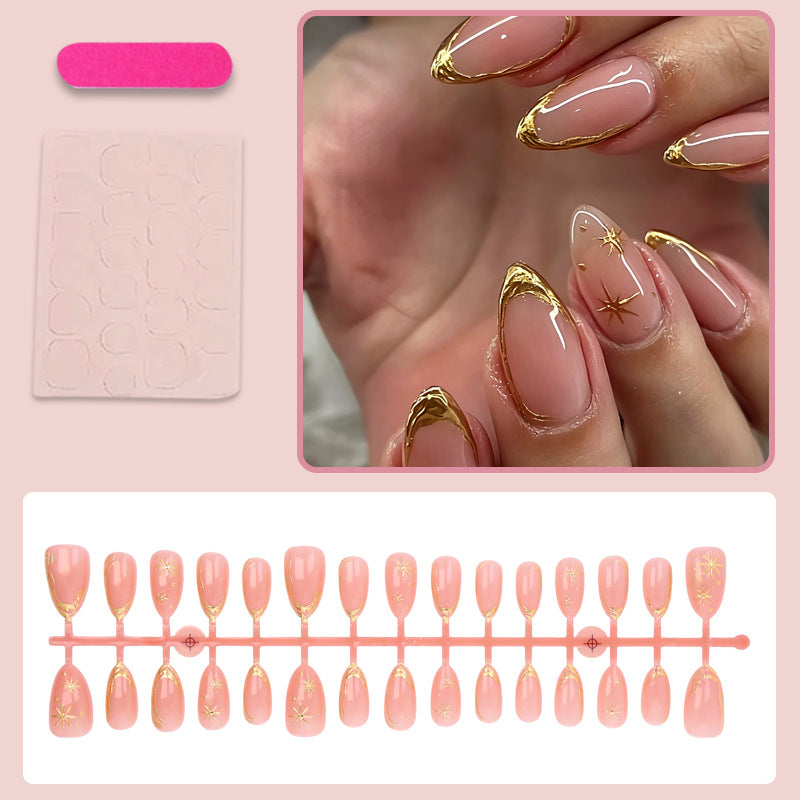 Art nail set with elegant gold accents and romantic star pattern Stornfield