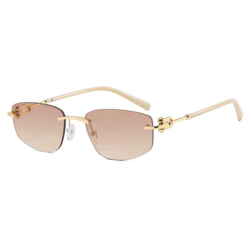 Ladies elegant semi-rimless glasses with luxurious metal frame and transparent lenses Stornfield