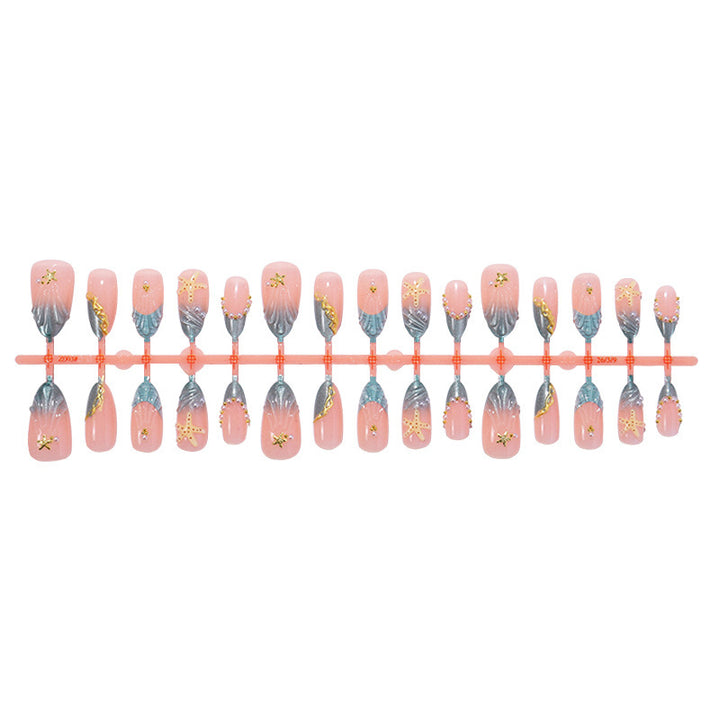 Glamorous artificial nail set with filigree decorations Stornfield