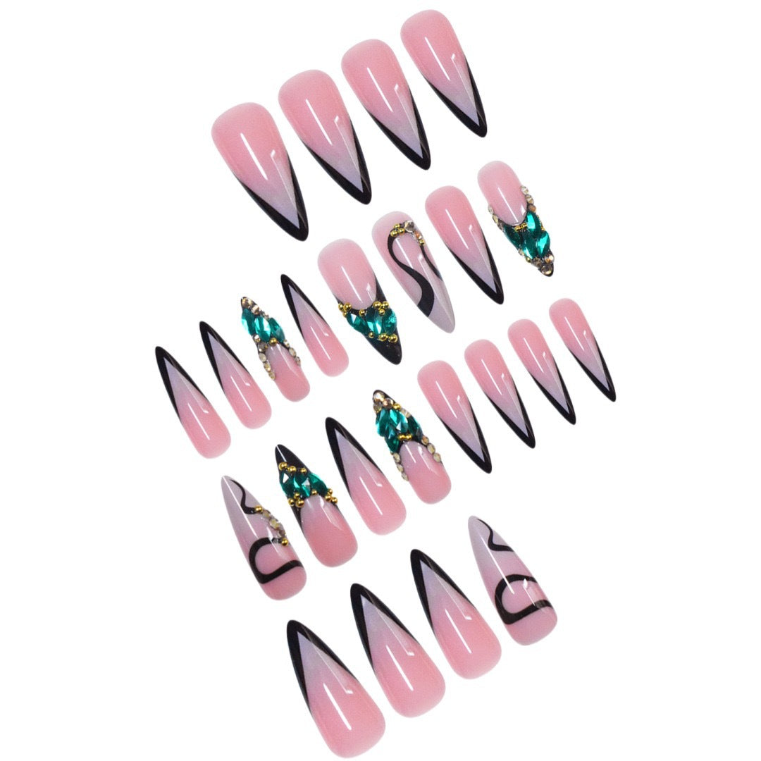 Elegant Stiletto Nail Enhancements with Gem Accents Stornfield