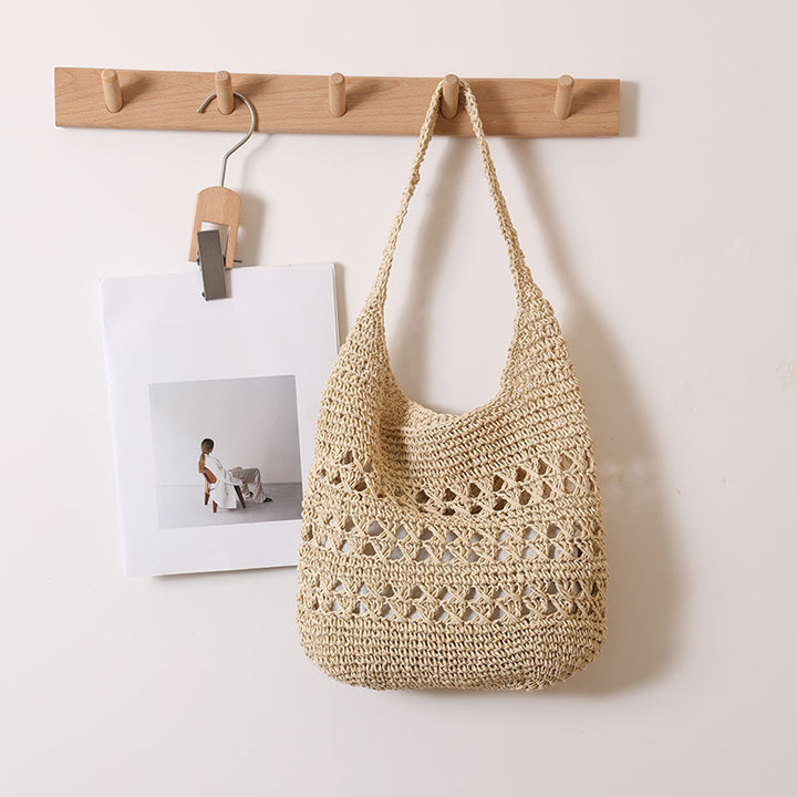Crocheted shoulder bag with decorative hole pattern Stornfield
